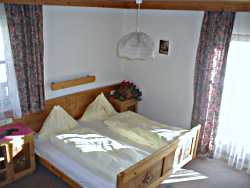 Double bed room with a lot of sun